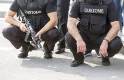 Customs and Border Protection Officers providing security.